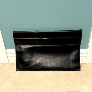 Leather carrying case in blackish brown